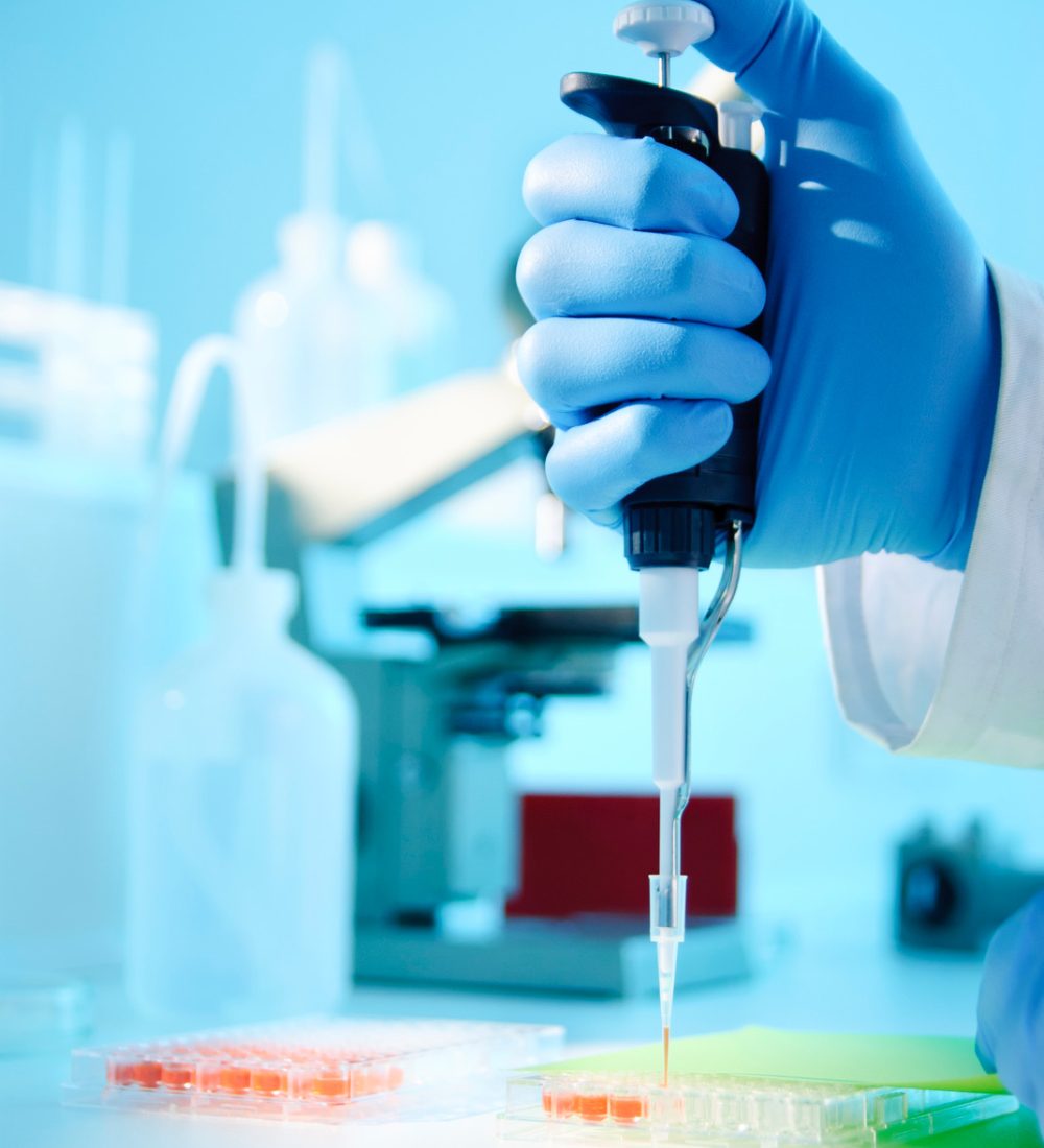 Scientist injecting liquid into a microtiter plateFor more science related images see this lightbox: