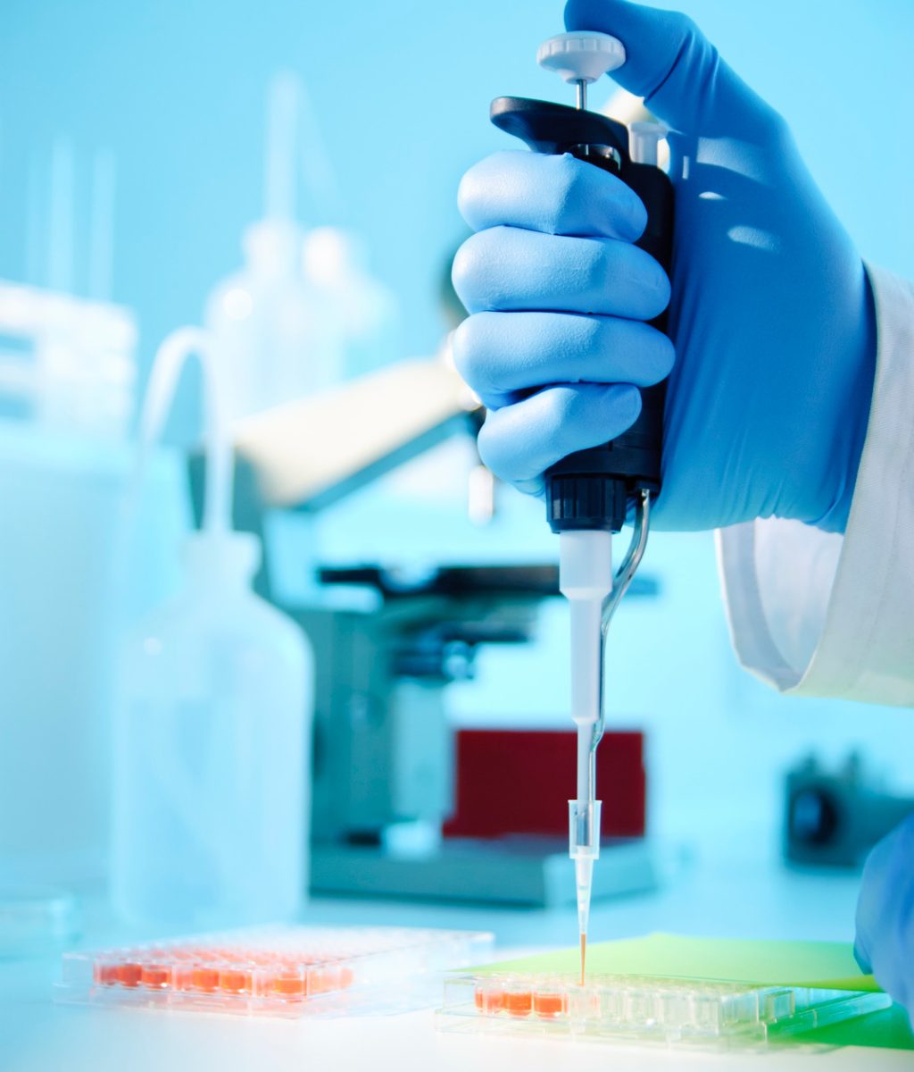 Scientist injecting liquid into a microtiter plateFor more science related images see this lightbox: